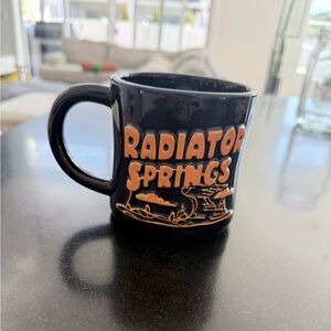 Radiator Springs Black and Orange Mug